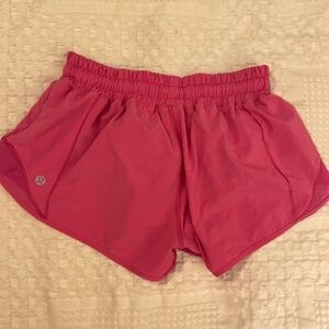 Lulu hotty shorts - we cut out tag but I believe they are a size 4. 24” waist